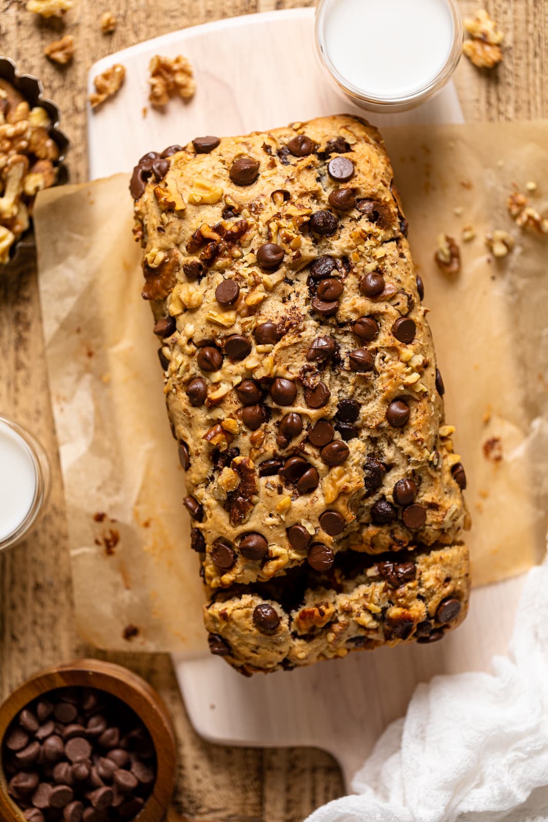 Overhead shot of Brown Butter Walnut Chocolate Chip Bread with one slice cut