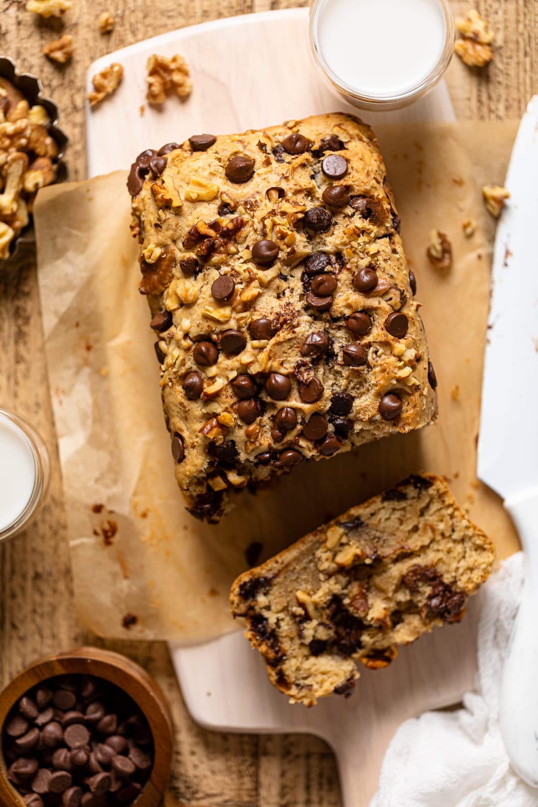 Overhead shot of Brown Butter Walnut Chocolate Chip Bread with one end sliced off