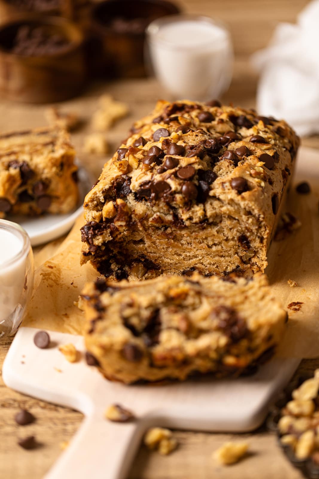 Loaf of Brown Butter Walnut Chocolate Chip Bread with one end sliced off