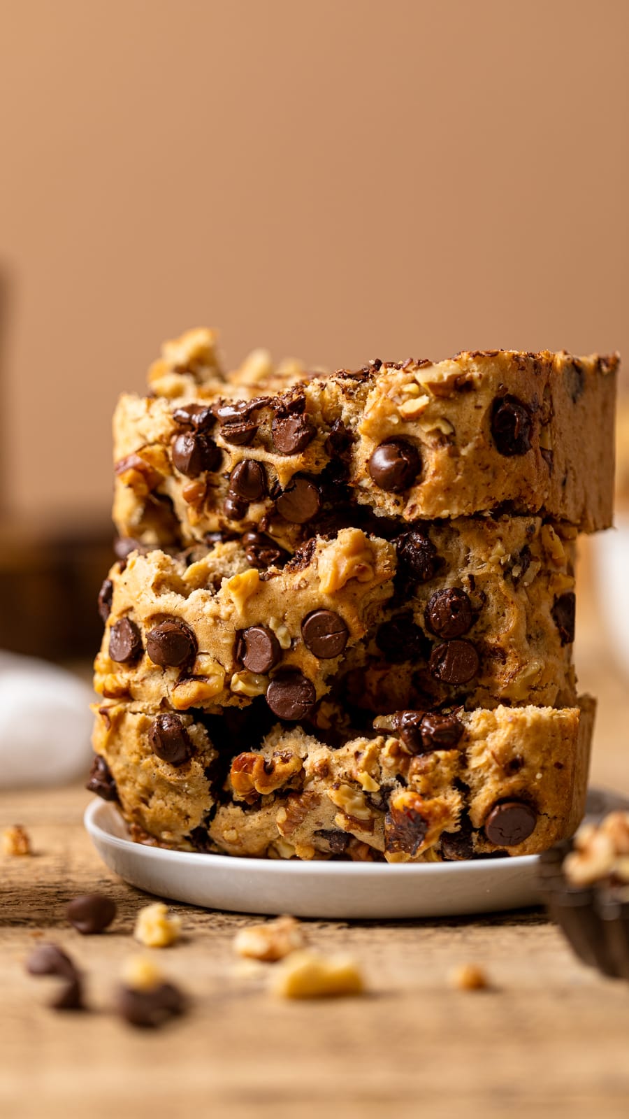 Closeup of a stack of slices of Brown Butter Walnut Chocolate Chip Bread