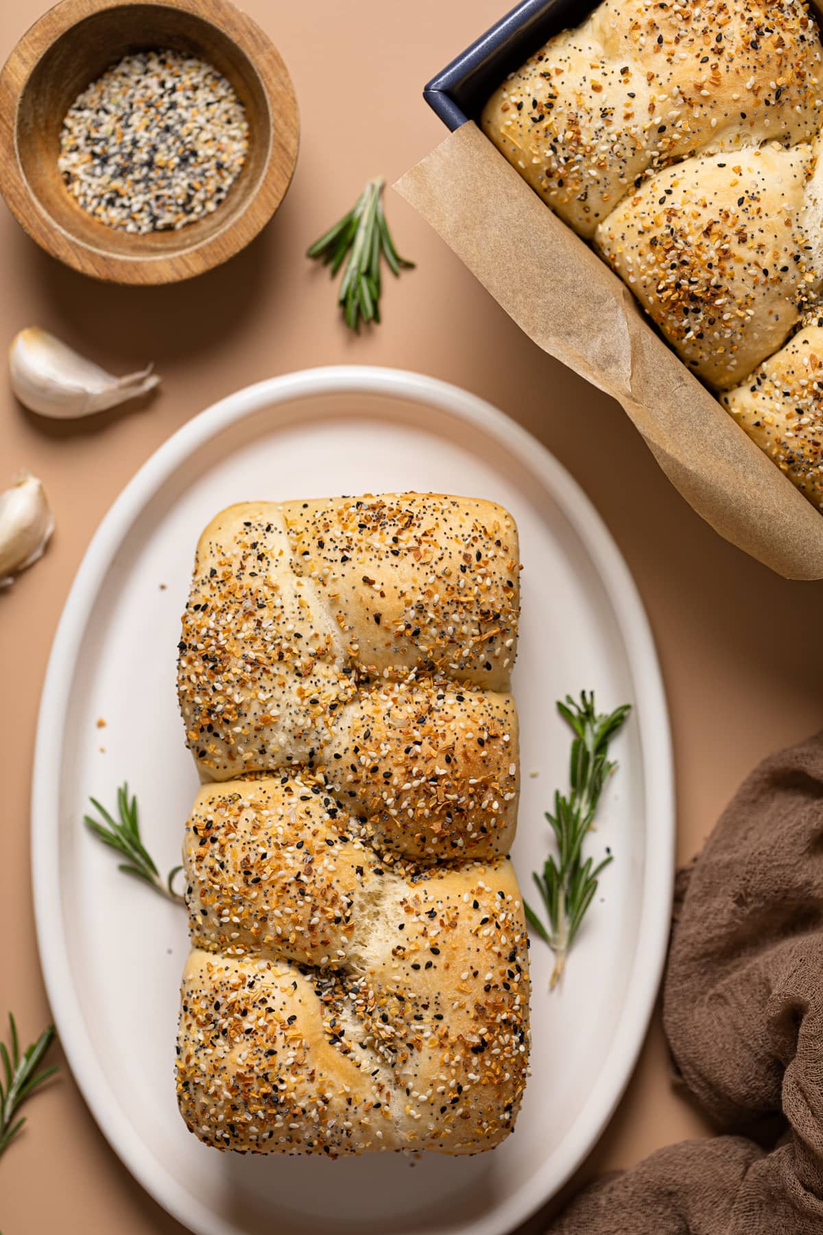 Overhead shot of two loaves of Vegan Everything Bagel Brioche Bread 