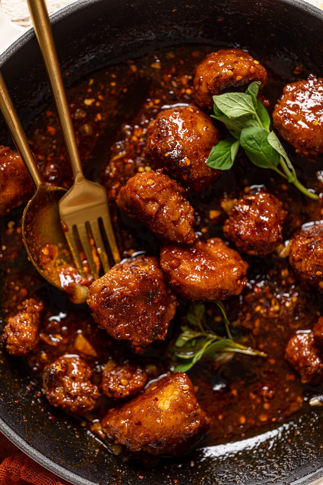 Spoon and fork with Southern Hot Honey Cauliflower Bites