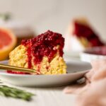 Slice of Grapefruit Olive Oil Cake with Raspberry Compote