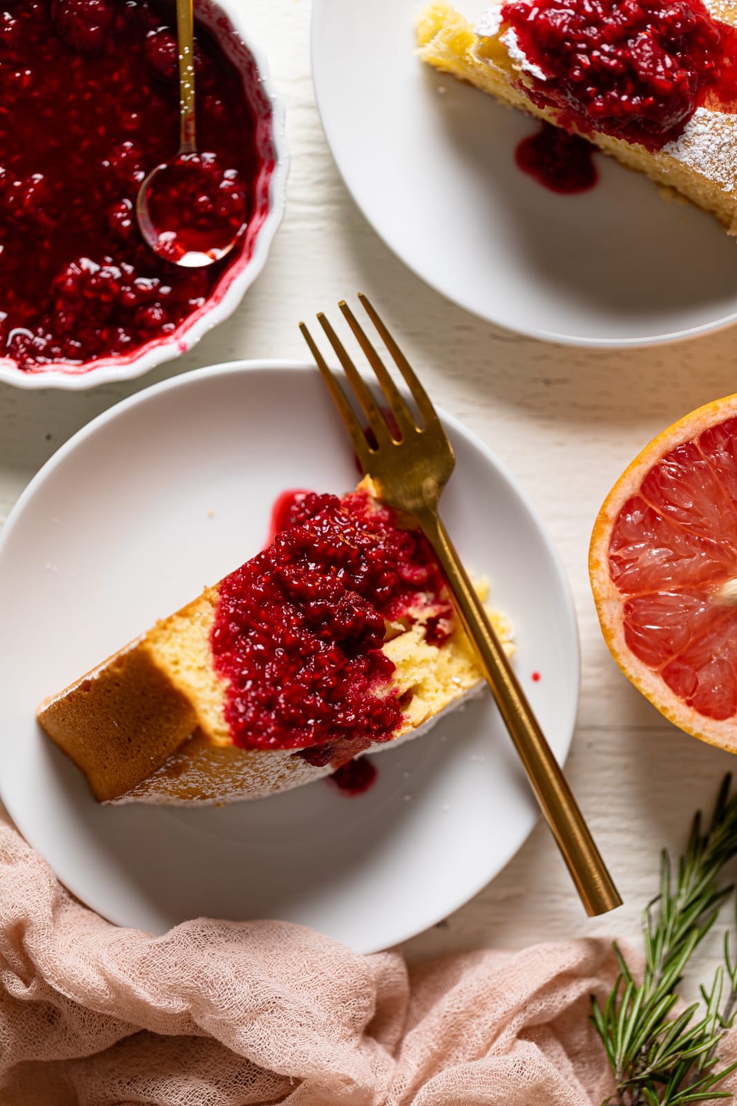 Overhead shot of a slice of Grapefruit Olive Oil Cake with Raspberry Compote