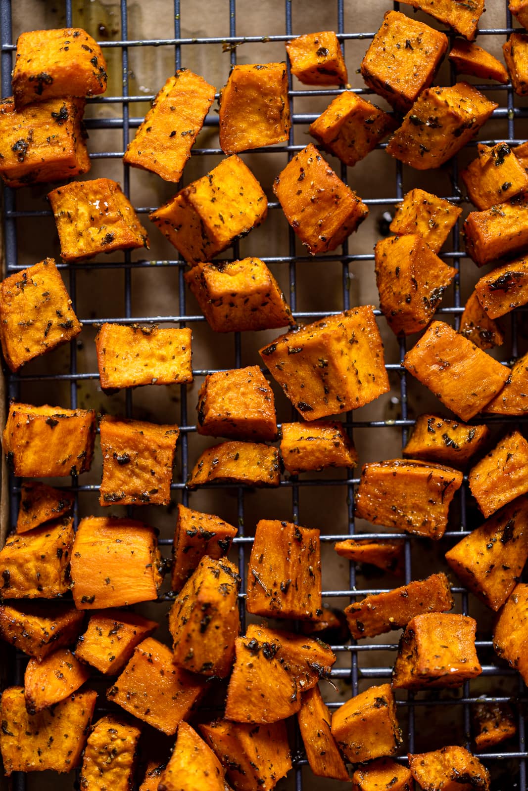 Roasted Sweet Potato pieces on a wire rack