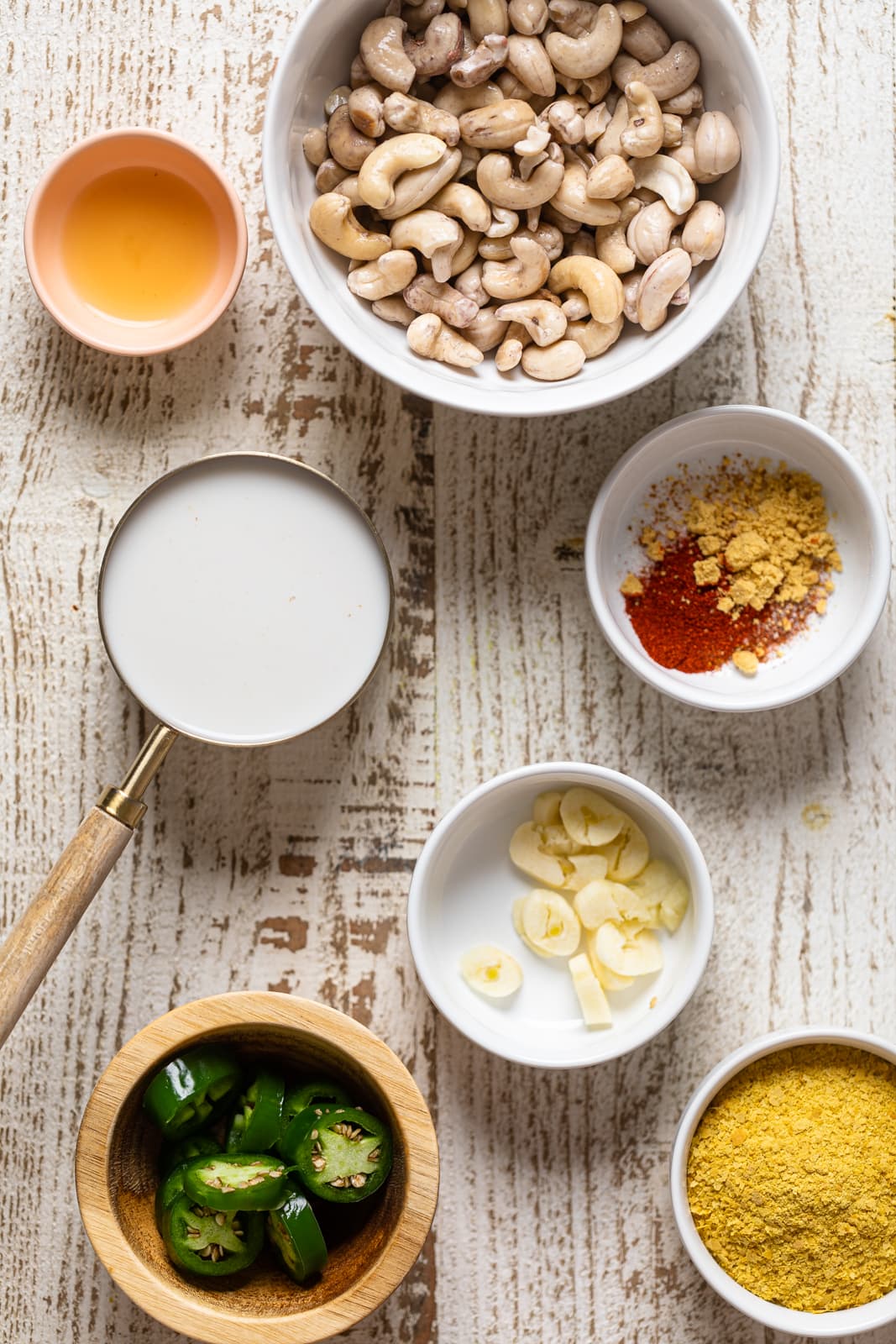 Ingredients for Vegan Jalapeno Queso Dip including cashews, jalapenos, and garlic