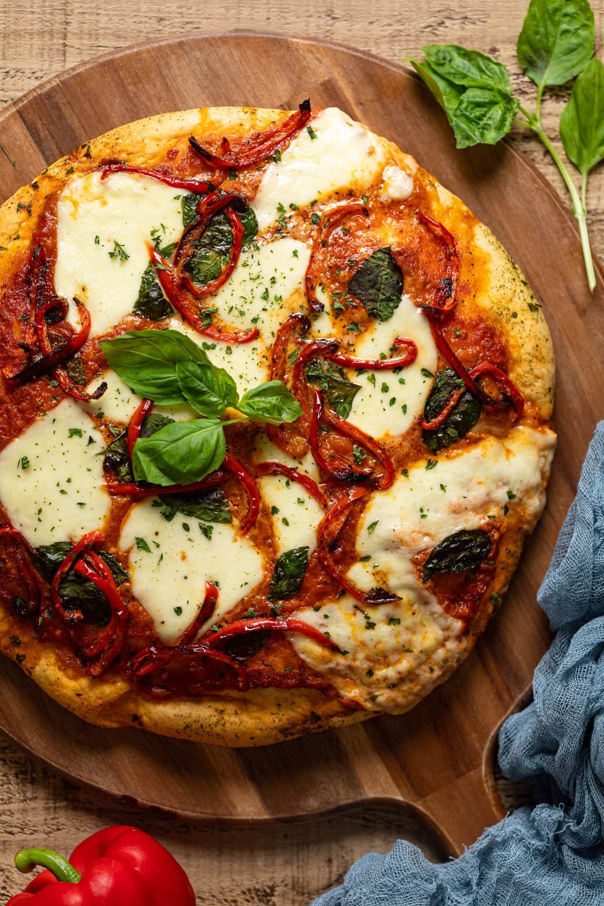 Overhead shot of Vodka Pizza on a wooden board