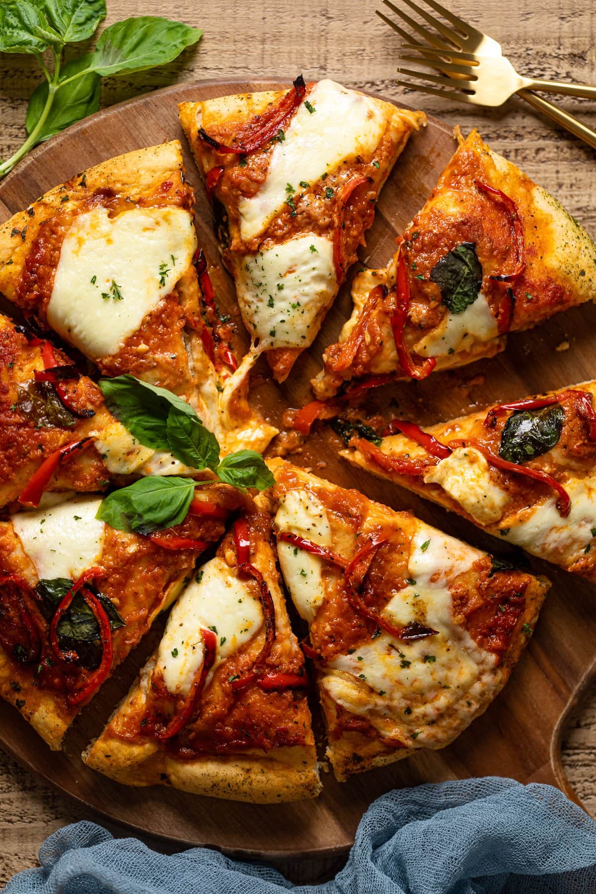 Sliced Vodka Pizza on a wooden board