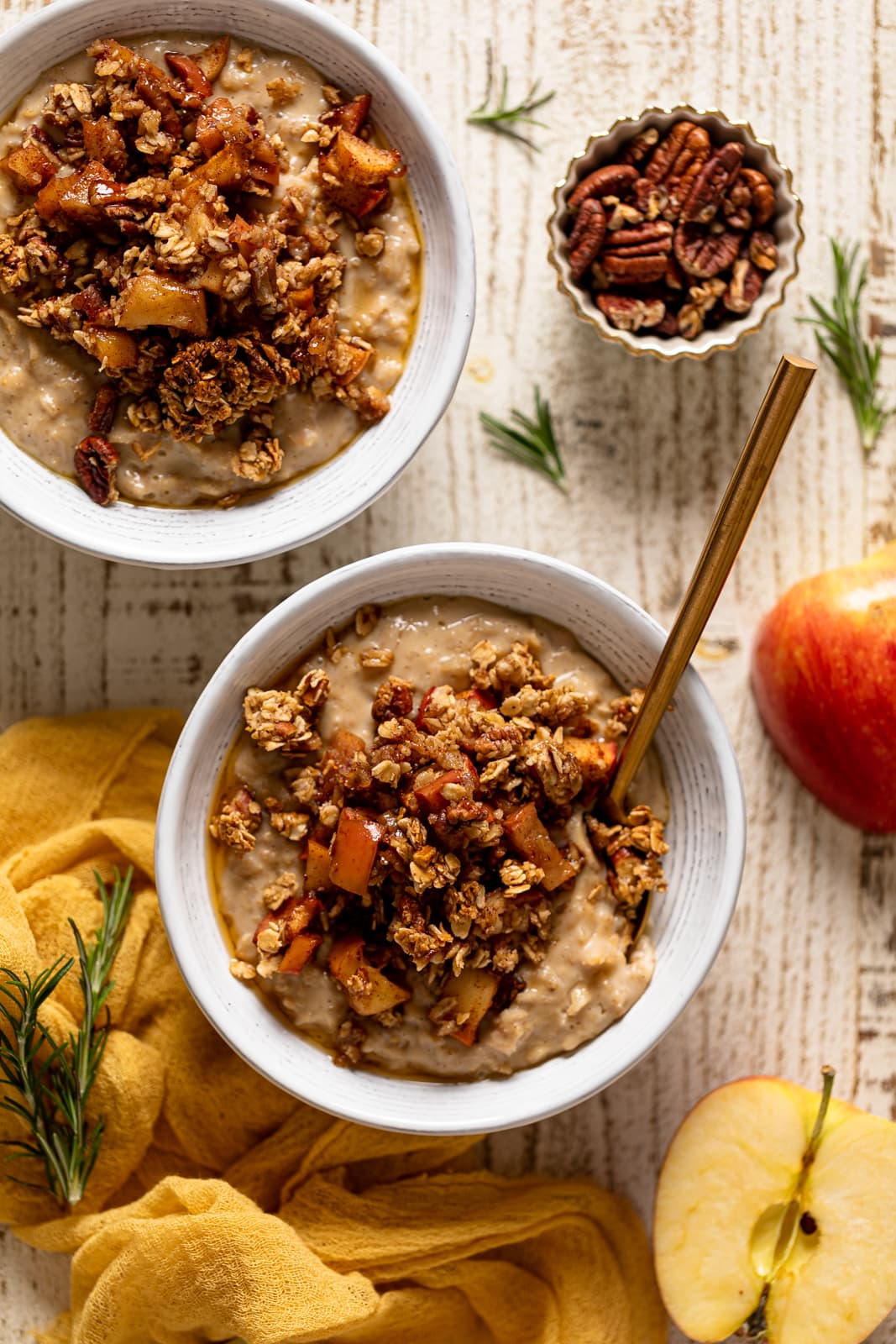 Overhead shot of a bowl of Breakfast Apple Crumble Oatmeal with a spoon