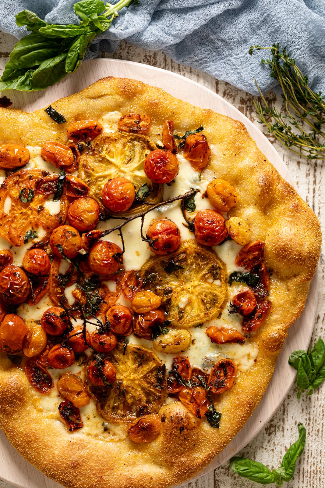 Overhead shot of an Herbed Butter Tomato Pizza
