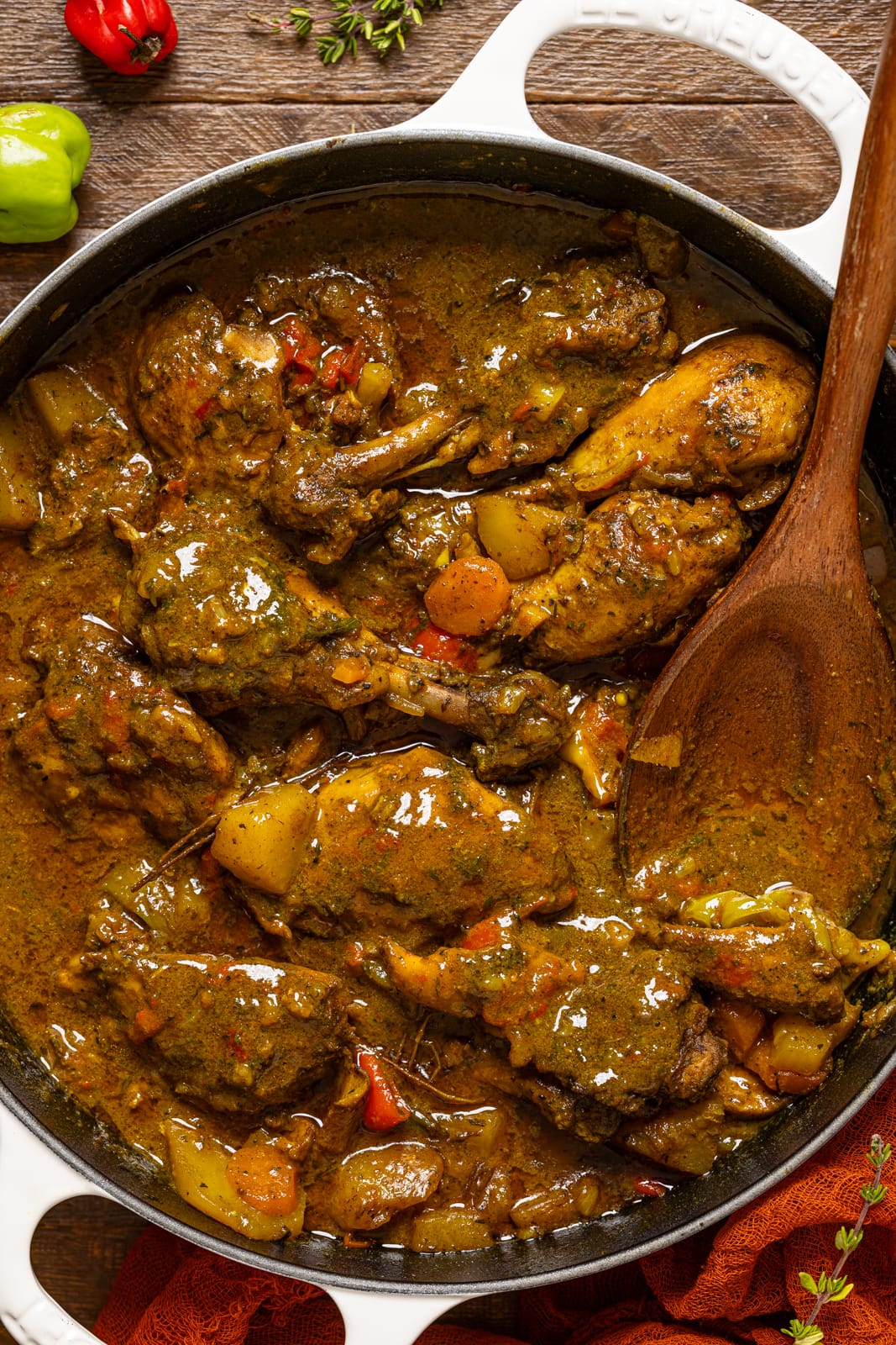 Up close shot of curry chicken in a pot.