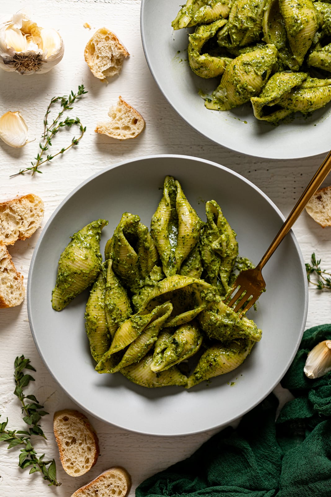 Plate and fork of Creamy Roasted Garlic Kale Pasta with Parmesan