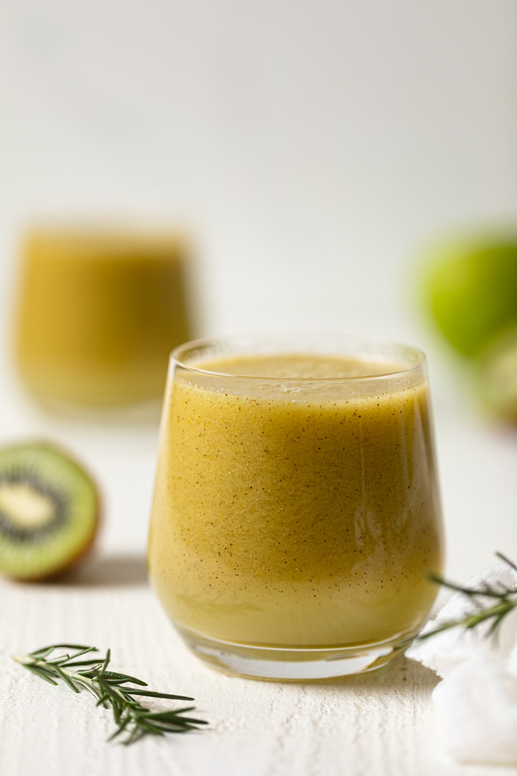 Closeup of a glass of Cleansing Apple Kiwi Juice