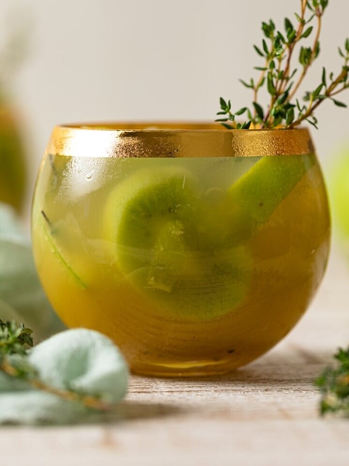 Green Goddess Mocktail in a gold-rimmed glass