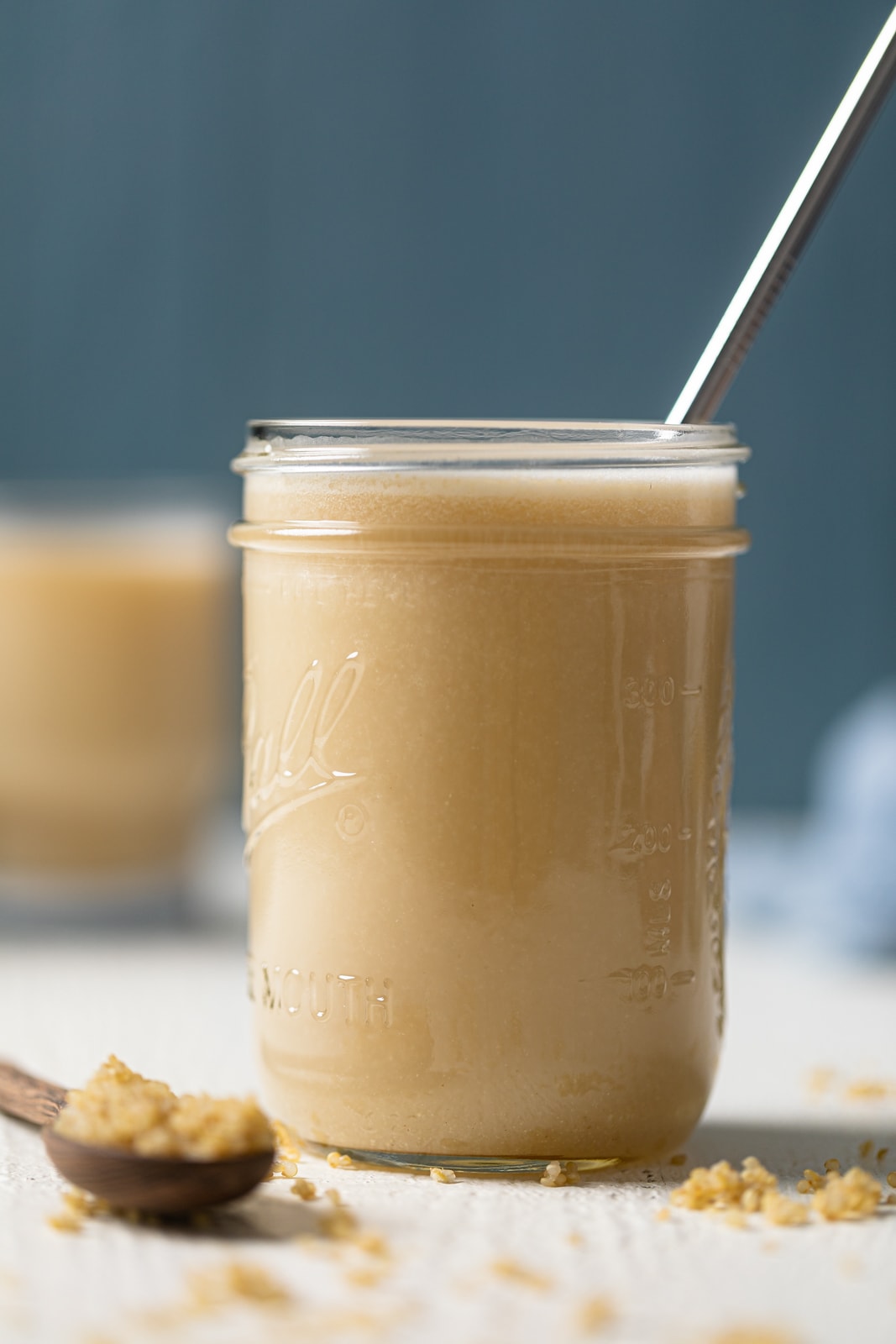 Closeup of a canning jar of quinoa milk