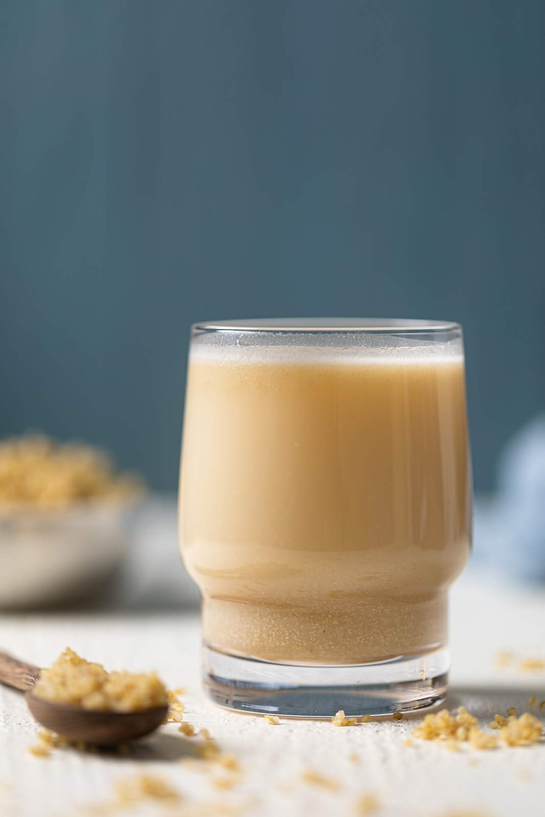 Closeup of a small glass of Quinoa Milk