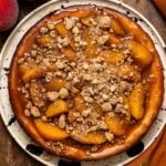 Southern Peach Cobbler Cheesecake on a platter.
