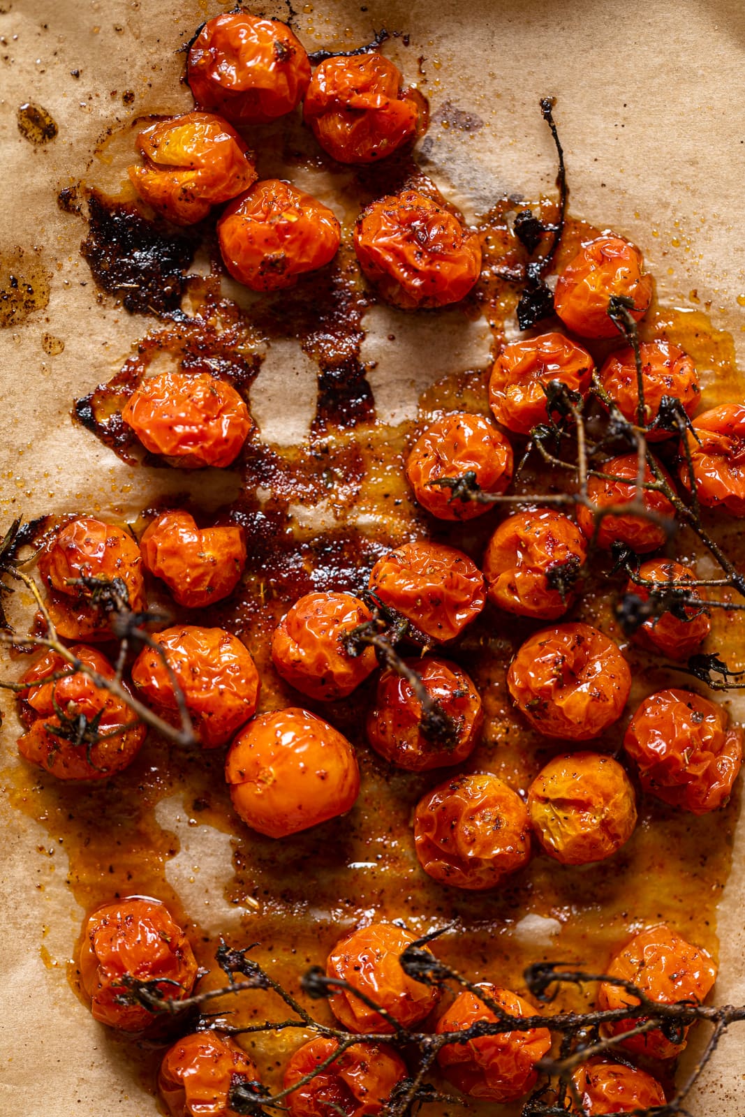 Roasted tomatoes on parchment paper