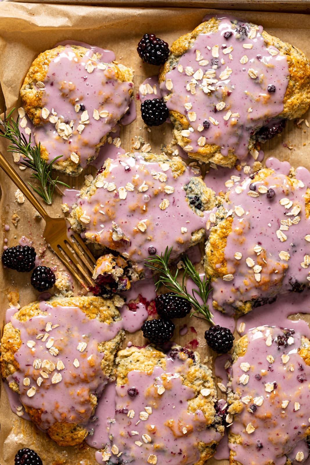 Overhead shot of several Blackberry White Chocolate Oatmeal Scones