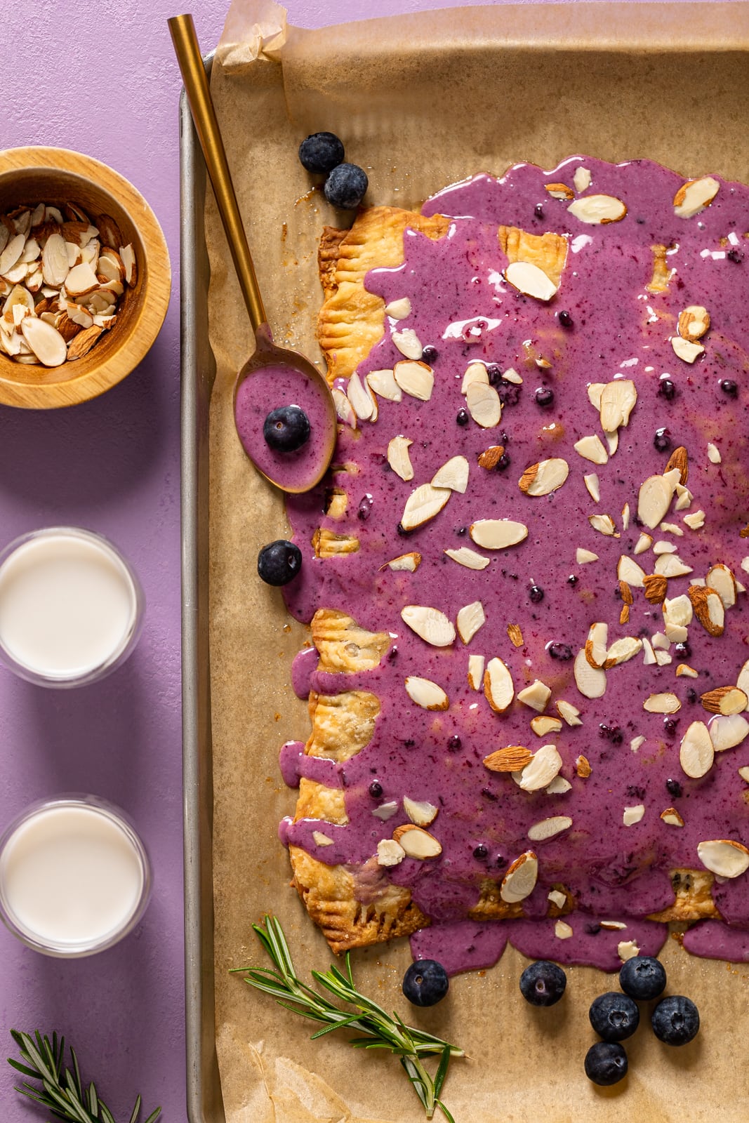 Whole Blueberry Almond Pop Tart on a baking sheet