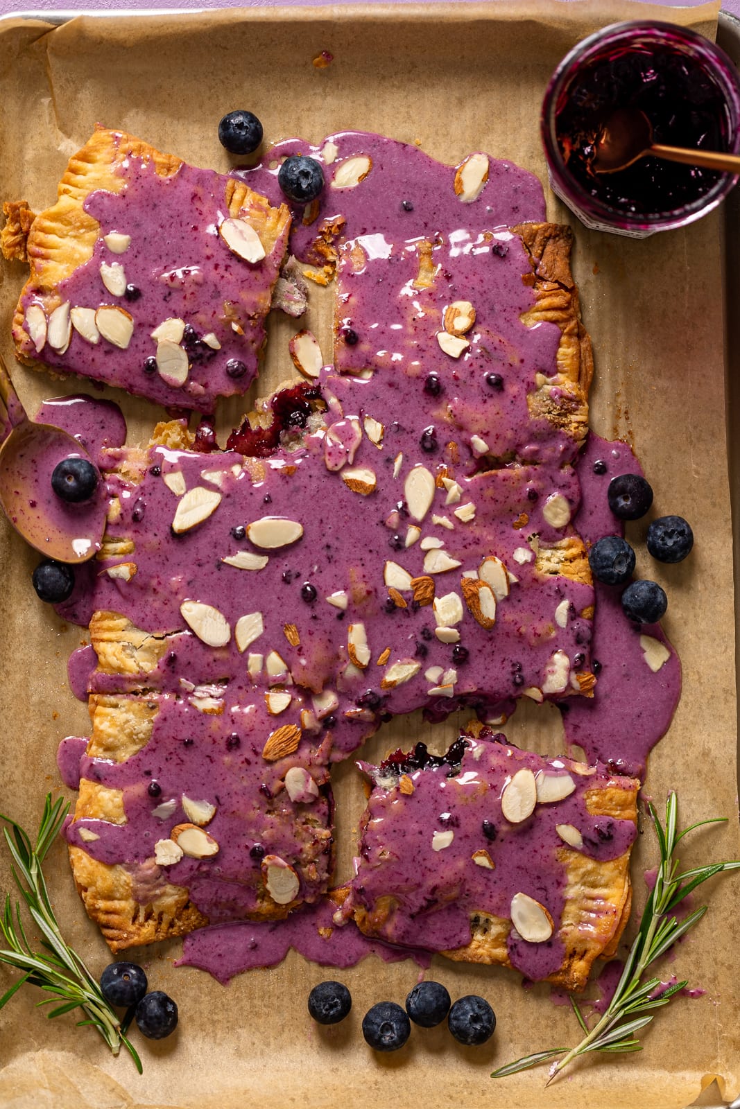 Sliced Blueberry Almond Pop Tart on parchment paper