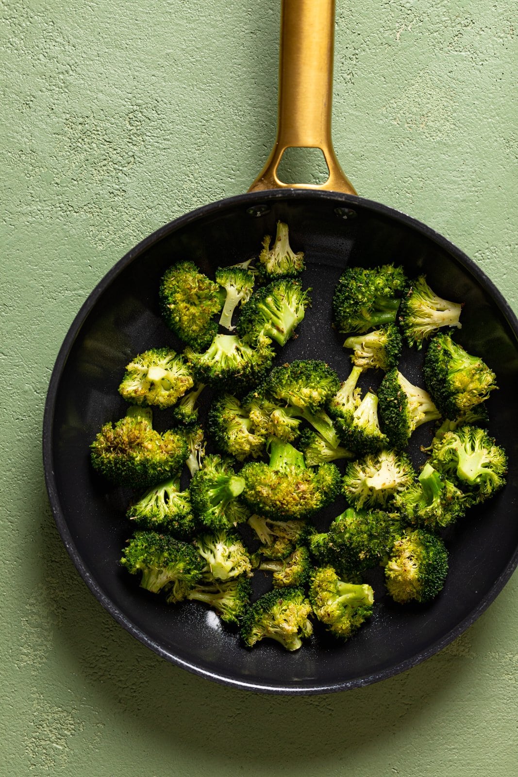 Chopped broccoli in a skillet