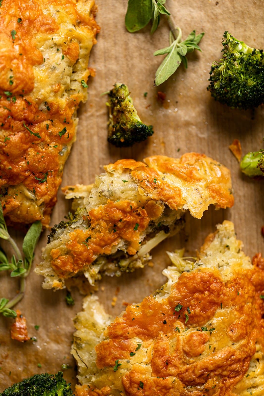 Closeup of a piece of broken Broccoli Cheddar Hand Pie