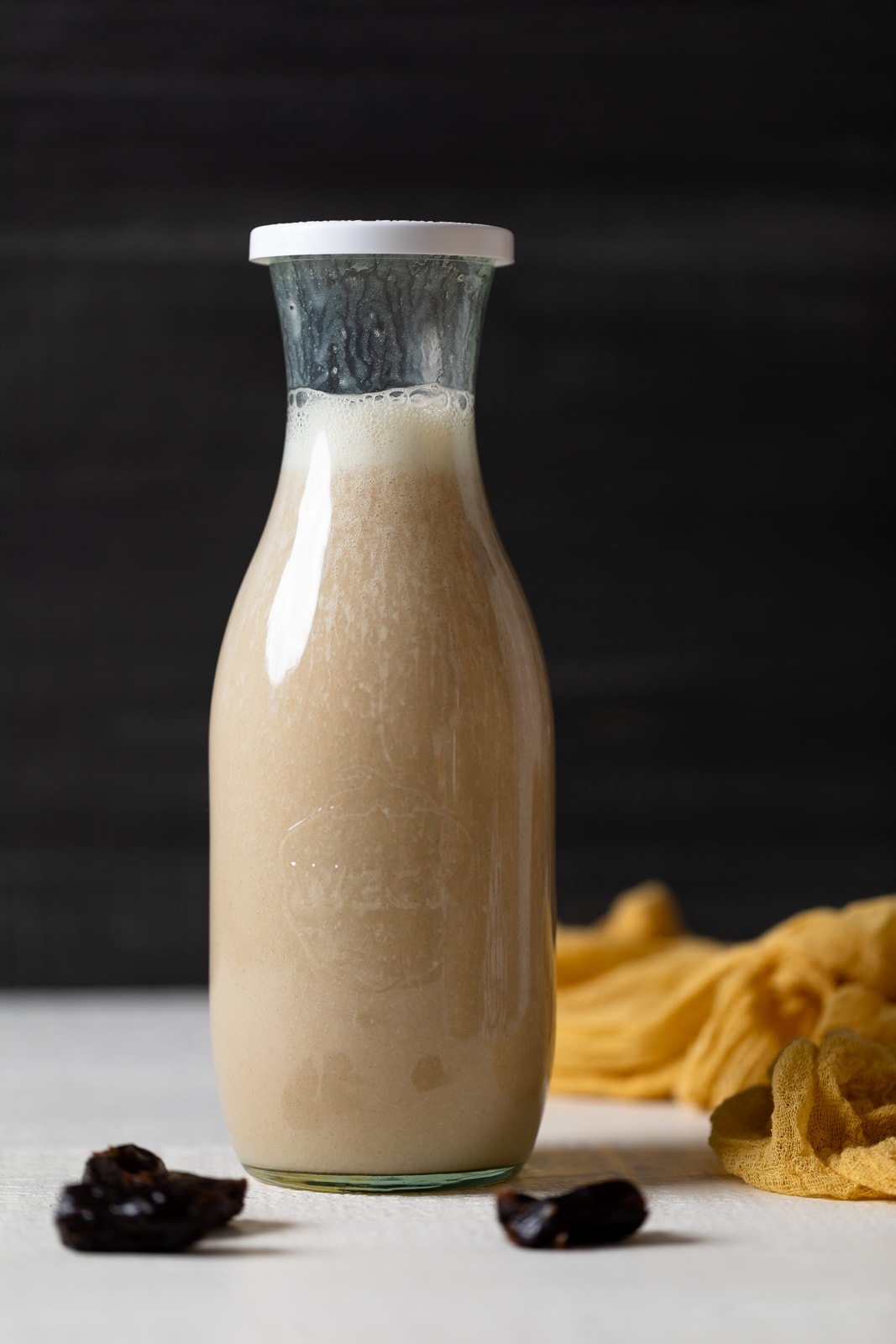 Glass jar of Cauliflower Milk with a white top