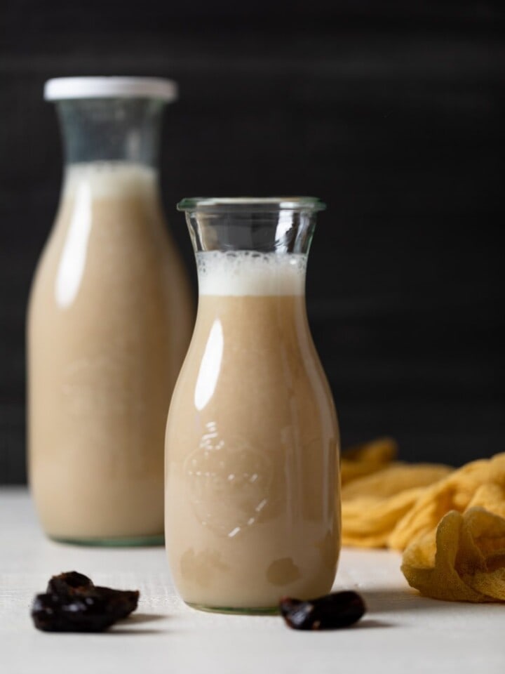 Two glass jars of Cauliflower Milk