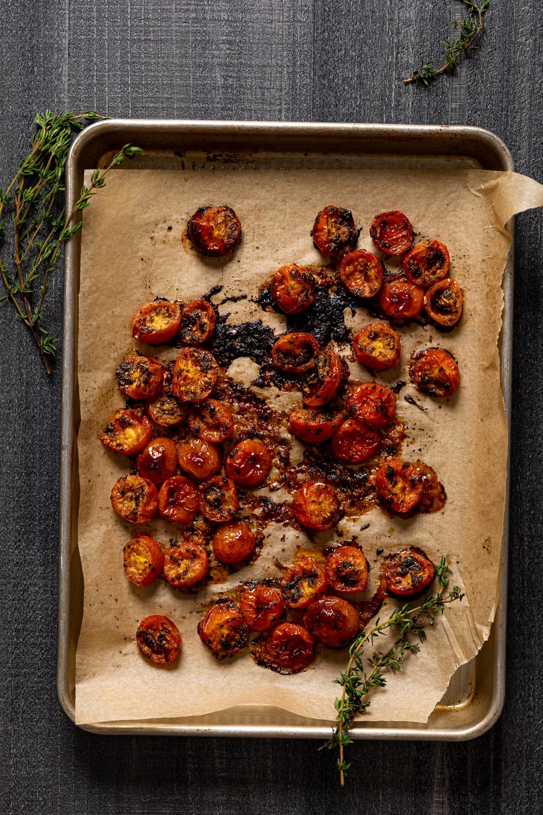 Roasted tomatoes on a baking sheet