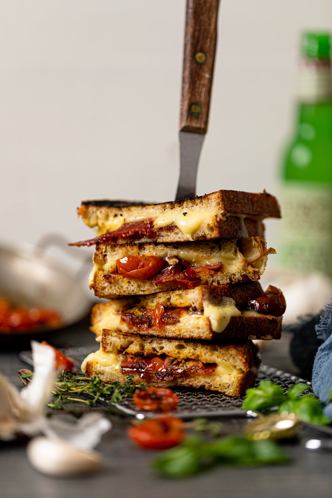 Stack of Southern-Style Bacon Grilled Cheese Sandwiches on a wire rack