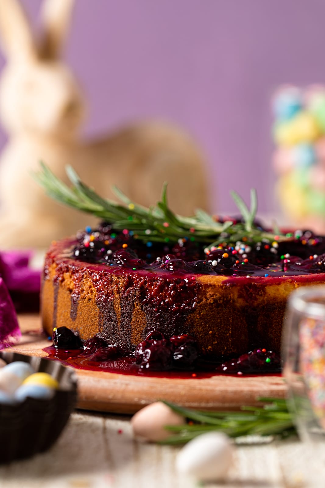 Full Lemon Blueberry Cheesecake on a wooden board