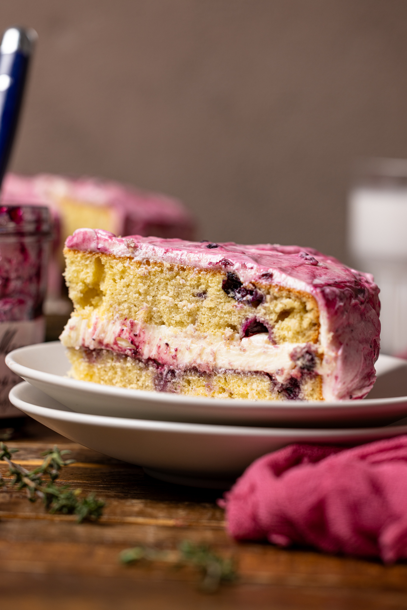 Up close shot of cake slice on two plates. 
