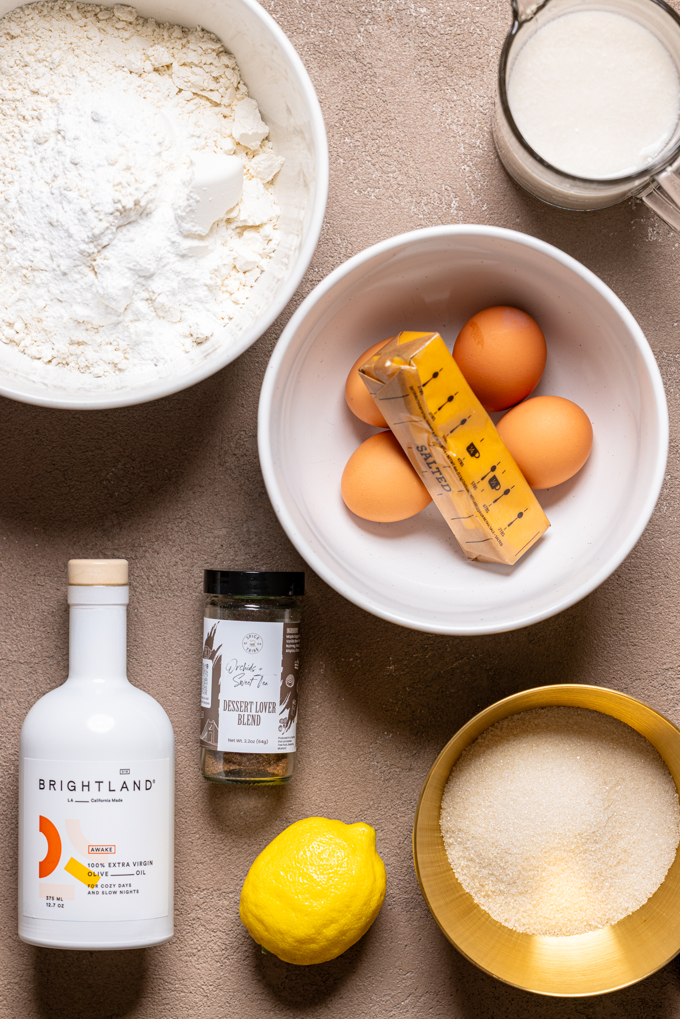 Ingredients on a brown-greyish table.