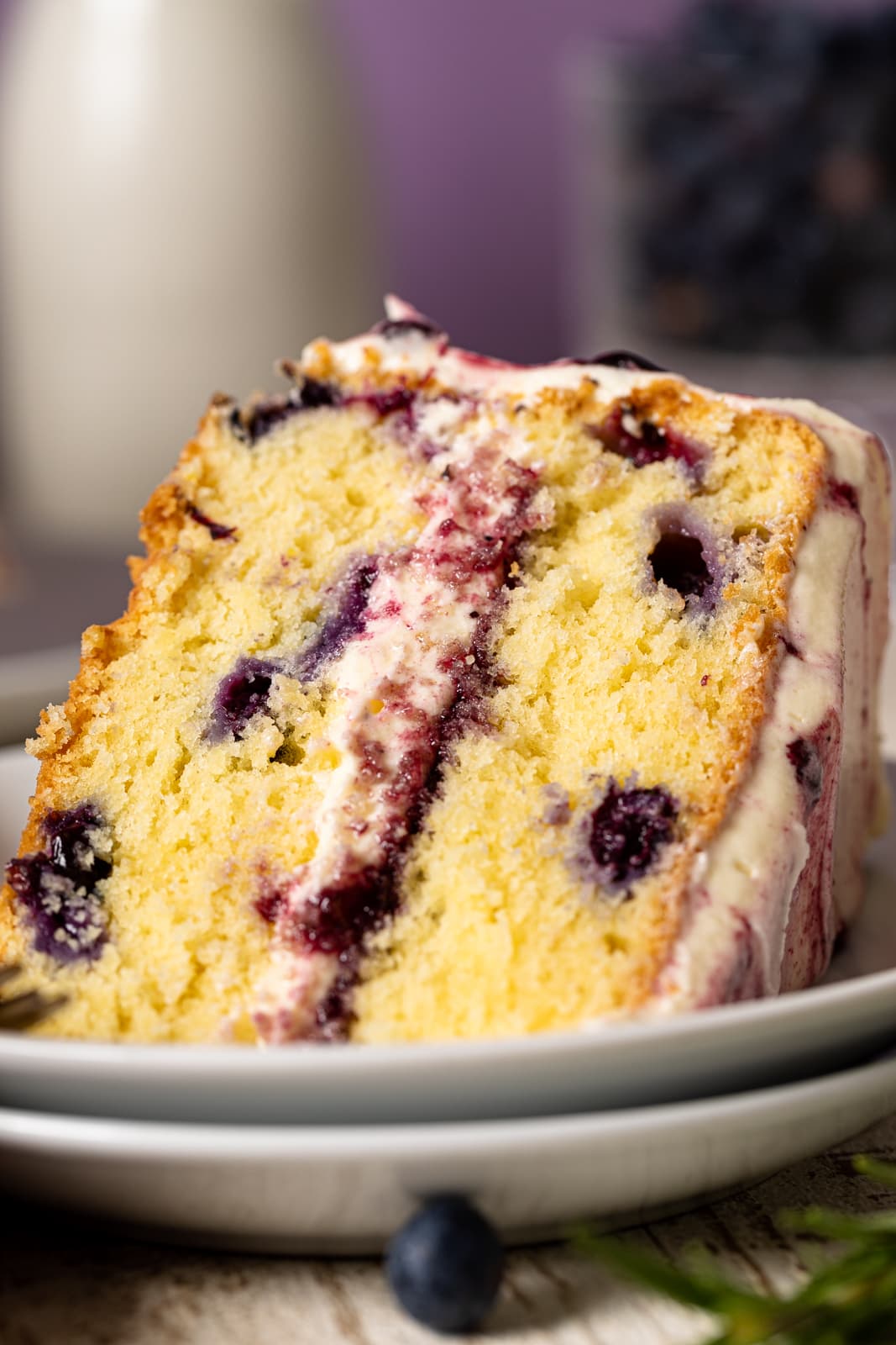 Closeup of a slice of Lemon Blueberry Olive Oil Cake