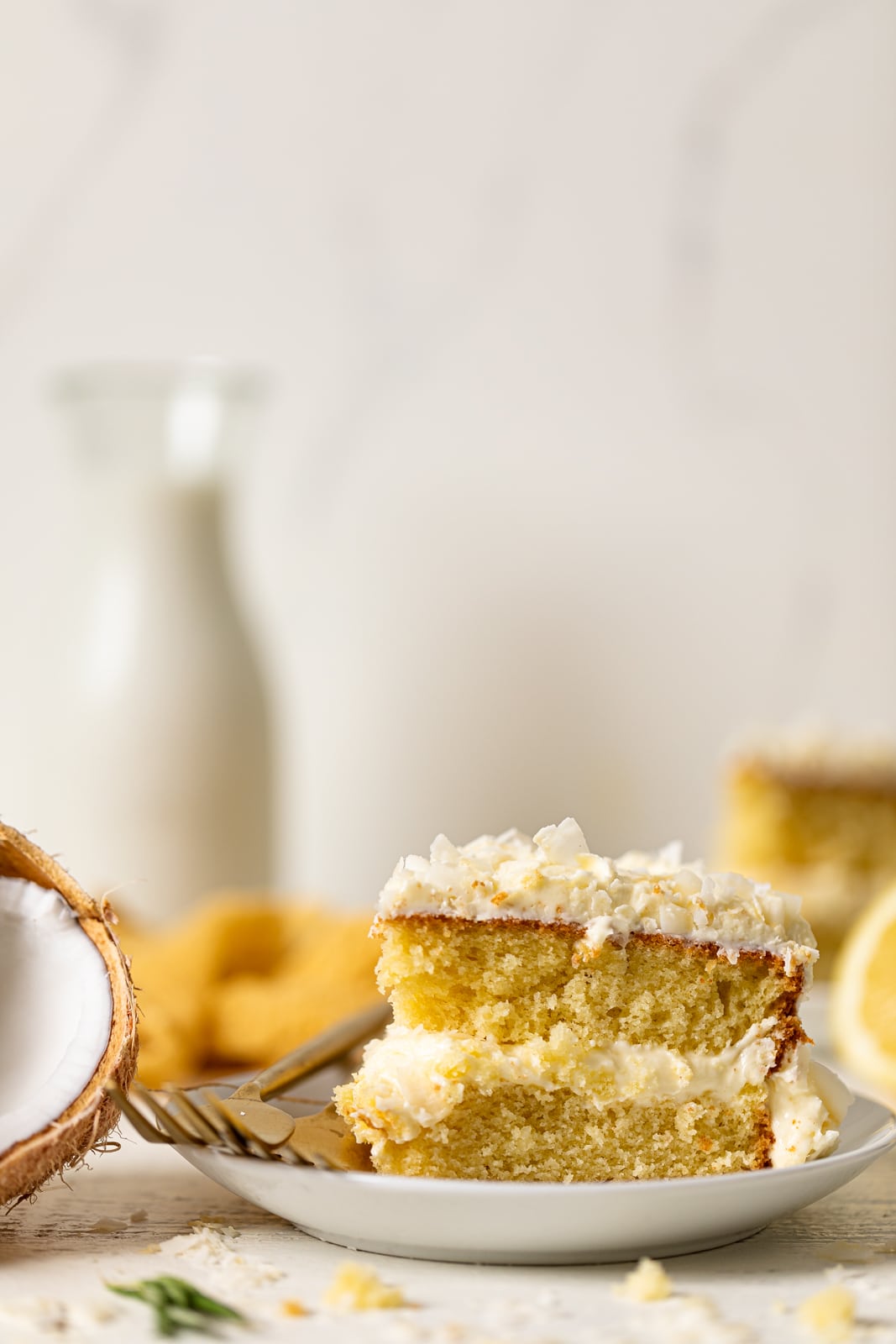 Slice of Lemon Coconut Cake on a plate