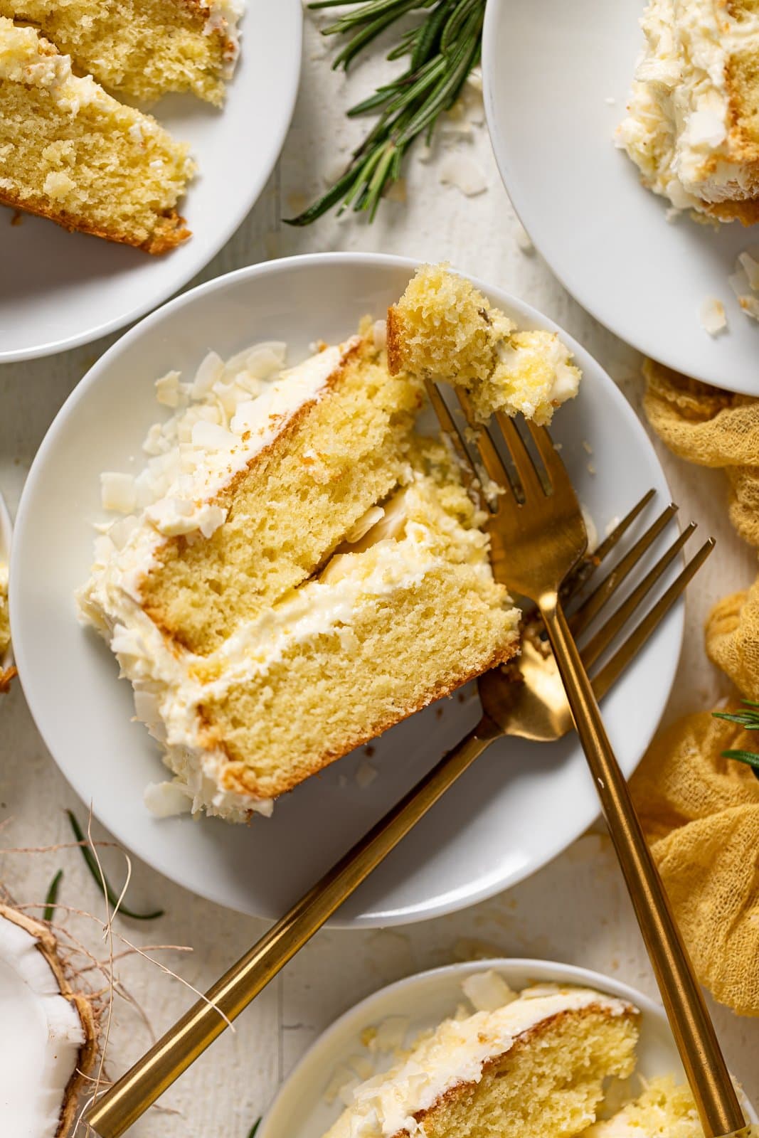 Slice of Lemon Coconut Cake with two forks