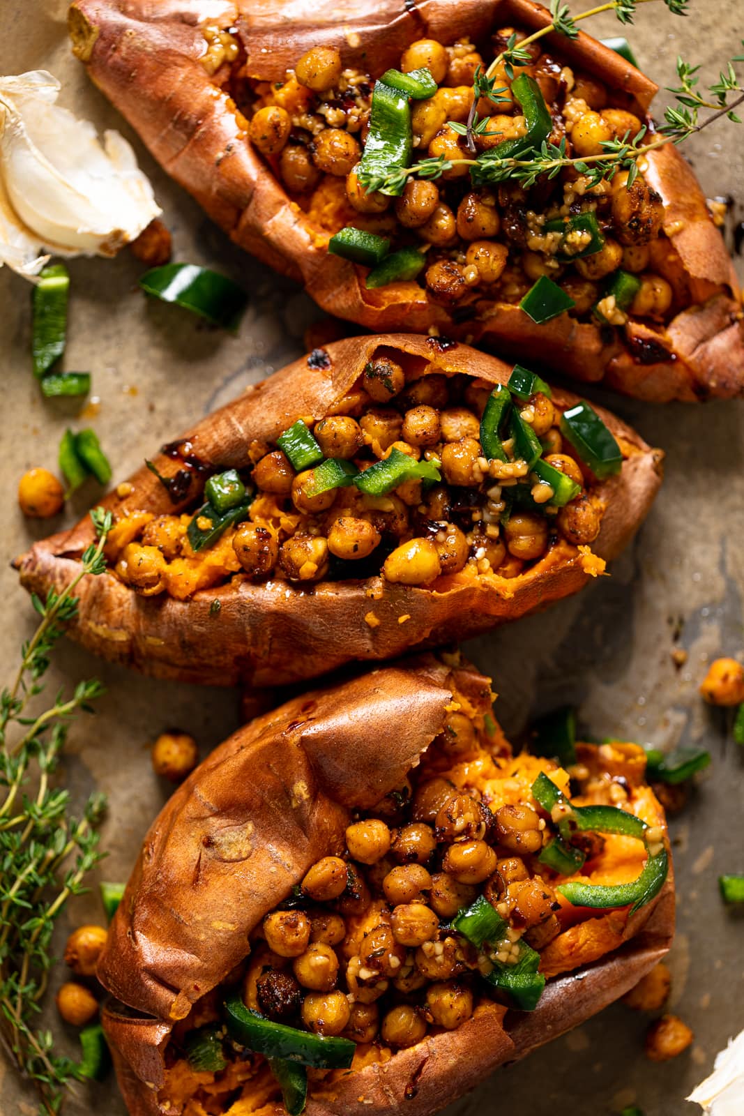 Overhead shot of several Spiced Chickpea Stuffed Sweet Potatoes