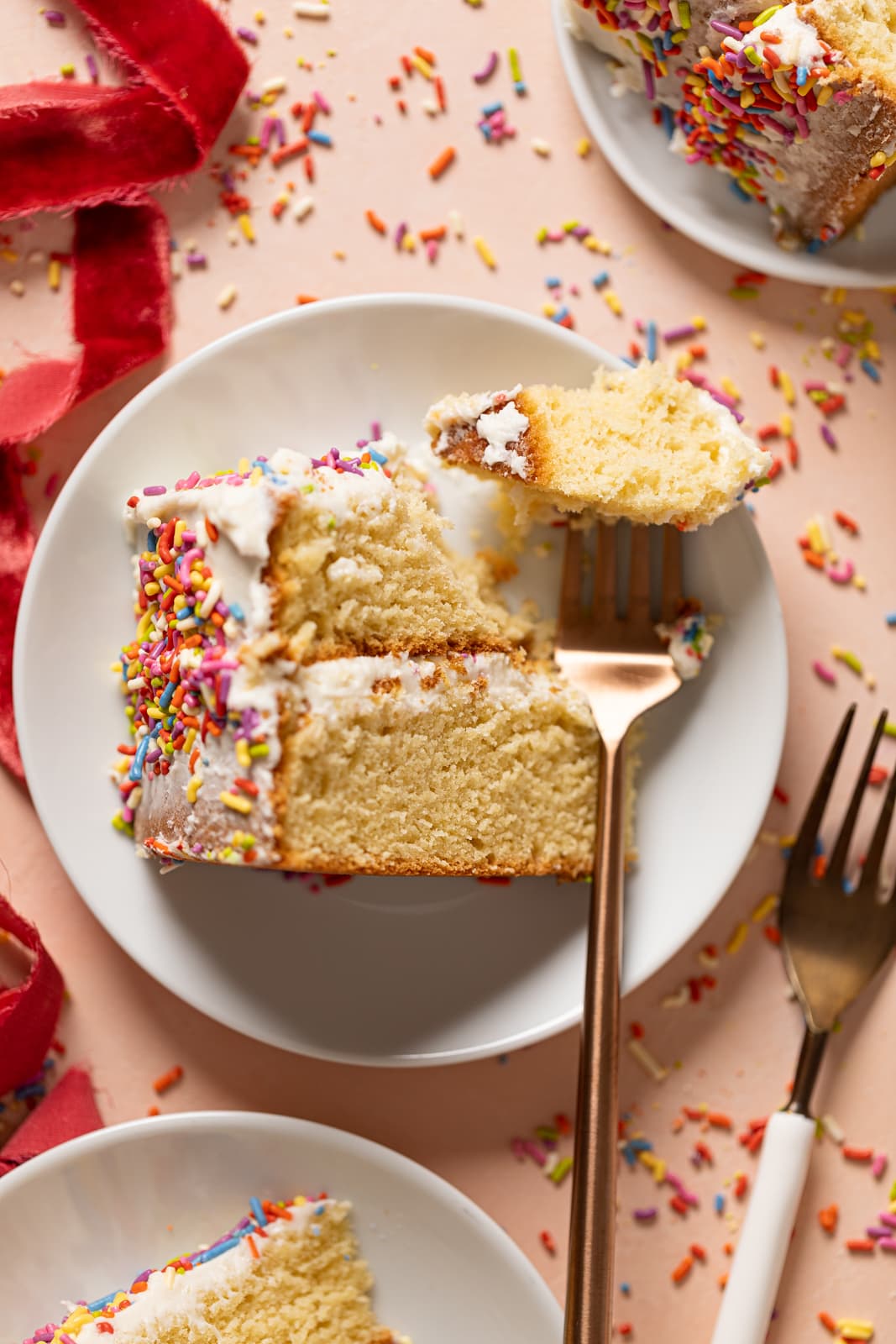 Slice of Vanilla Yogurt Cake with Sprinkles on a small plate