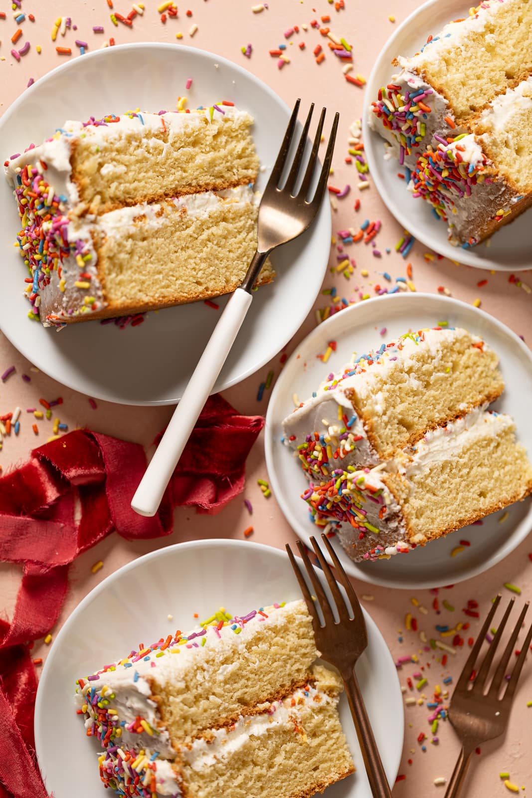 Slices of Vanilla Yogurt Cake with Sprinkles on small plates