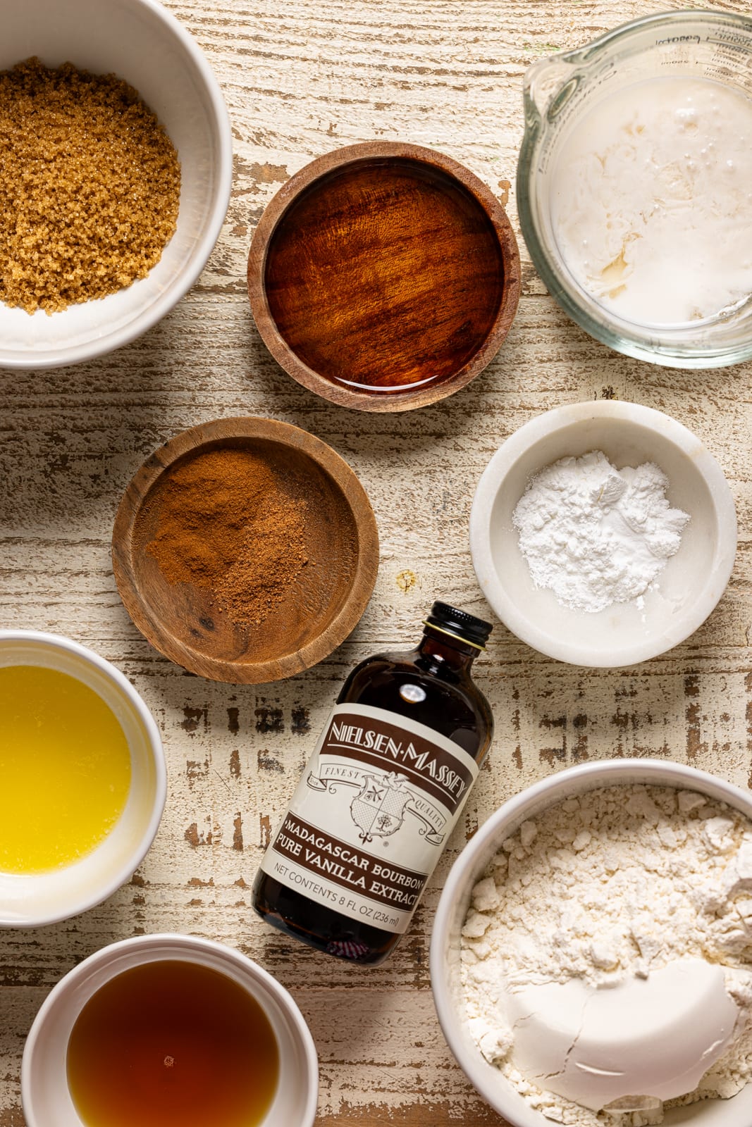 Ingredients on a white wood table.