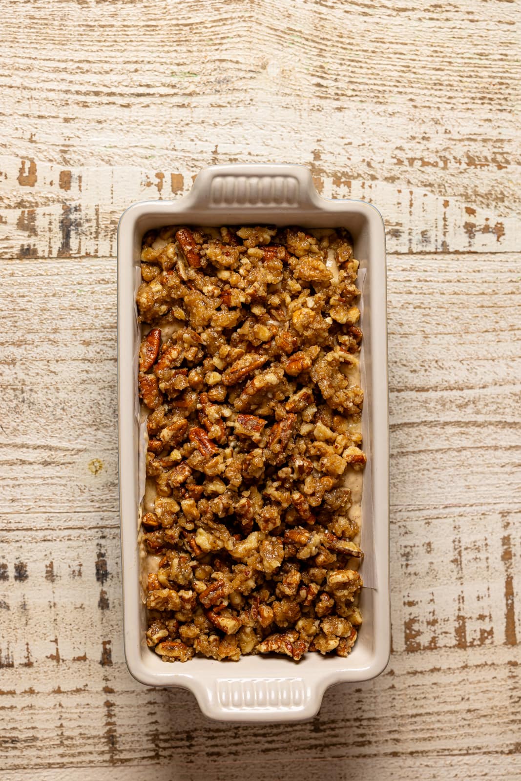 Banana bread ingredients in a pan.