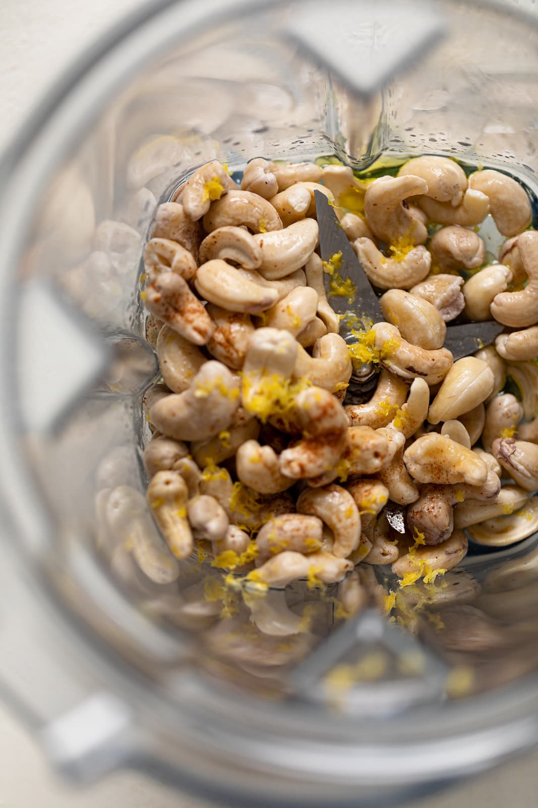 Cashews and lemon zest in a blender