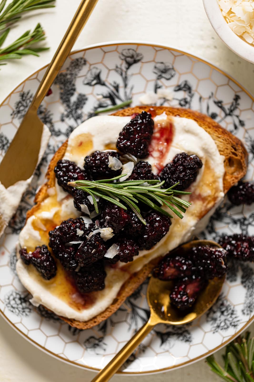 Vegan Lemon Cream Cheese Breakfast Toast with Roasted Blackberries on a plate