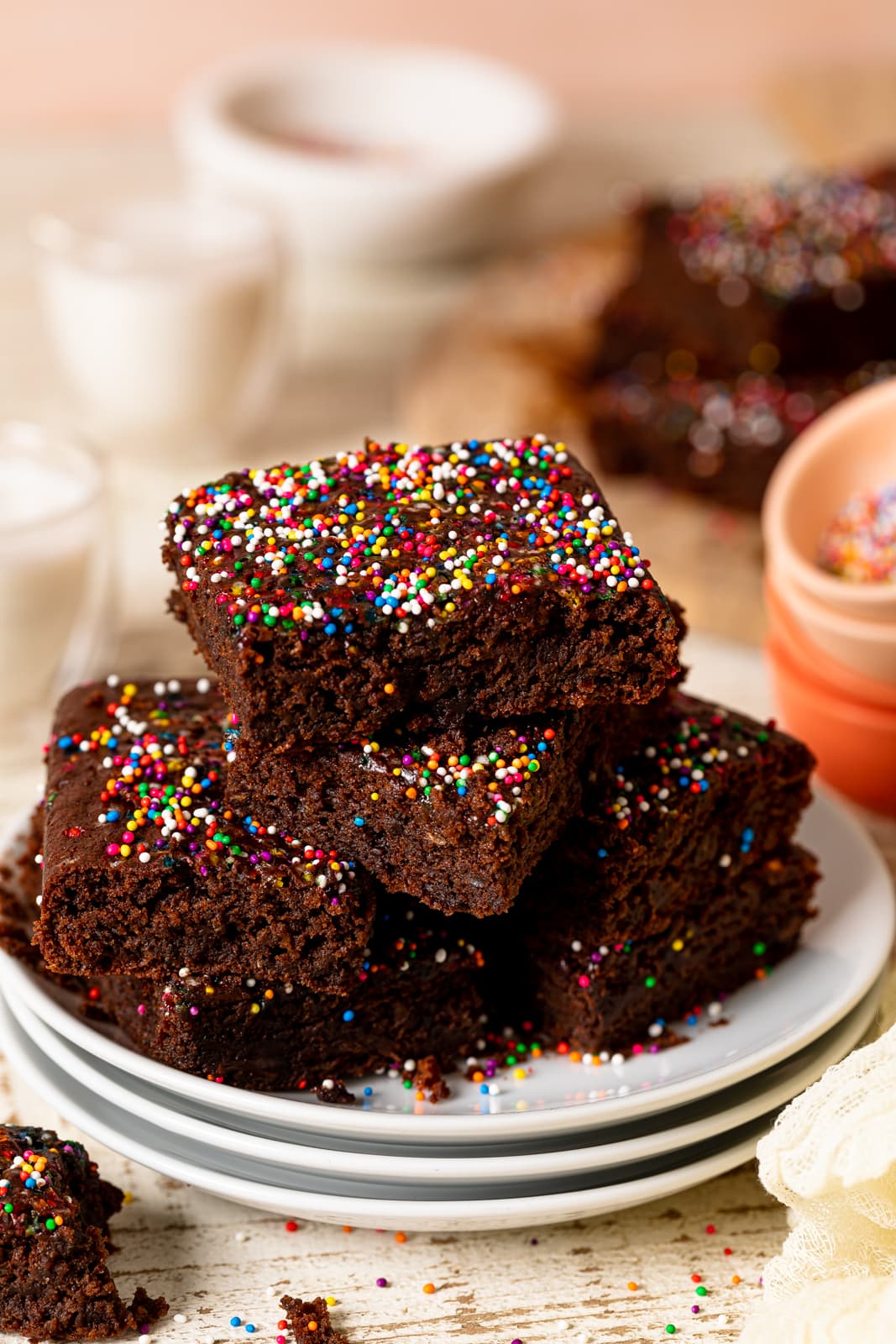 Pile of Vegan Zucchini Brownies on three plates