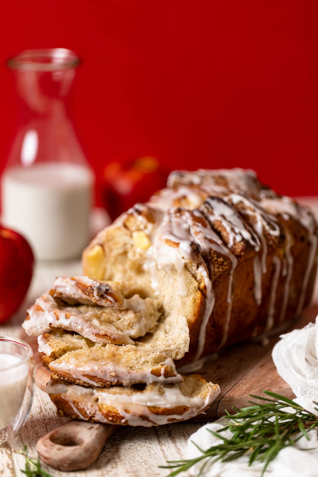 Loaf of Apple Cinnamon Bread with several pieces pulled off