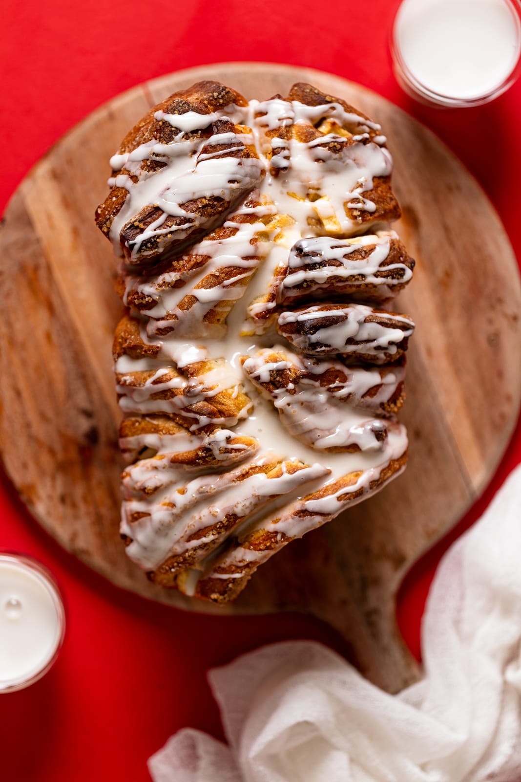 Overhead shot of a loaf of glazed Vegan Apple Cinnamon Pull-Apart Bread