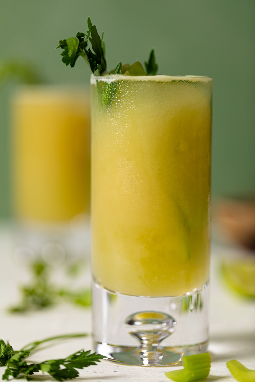 Closeup of a glass of Celery Pineapple Detox Mocktail