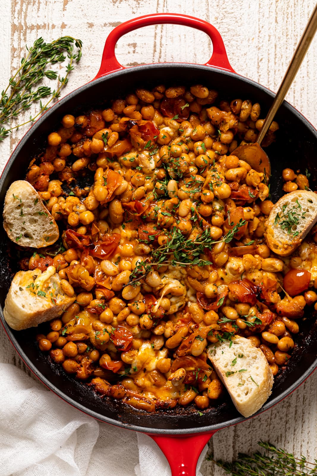 Skillet of Saucy Baked Chickpea and White Beans