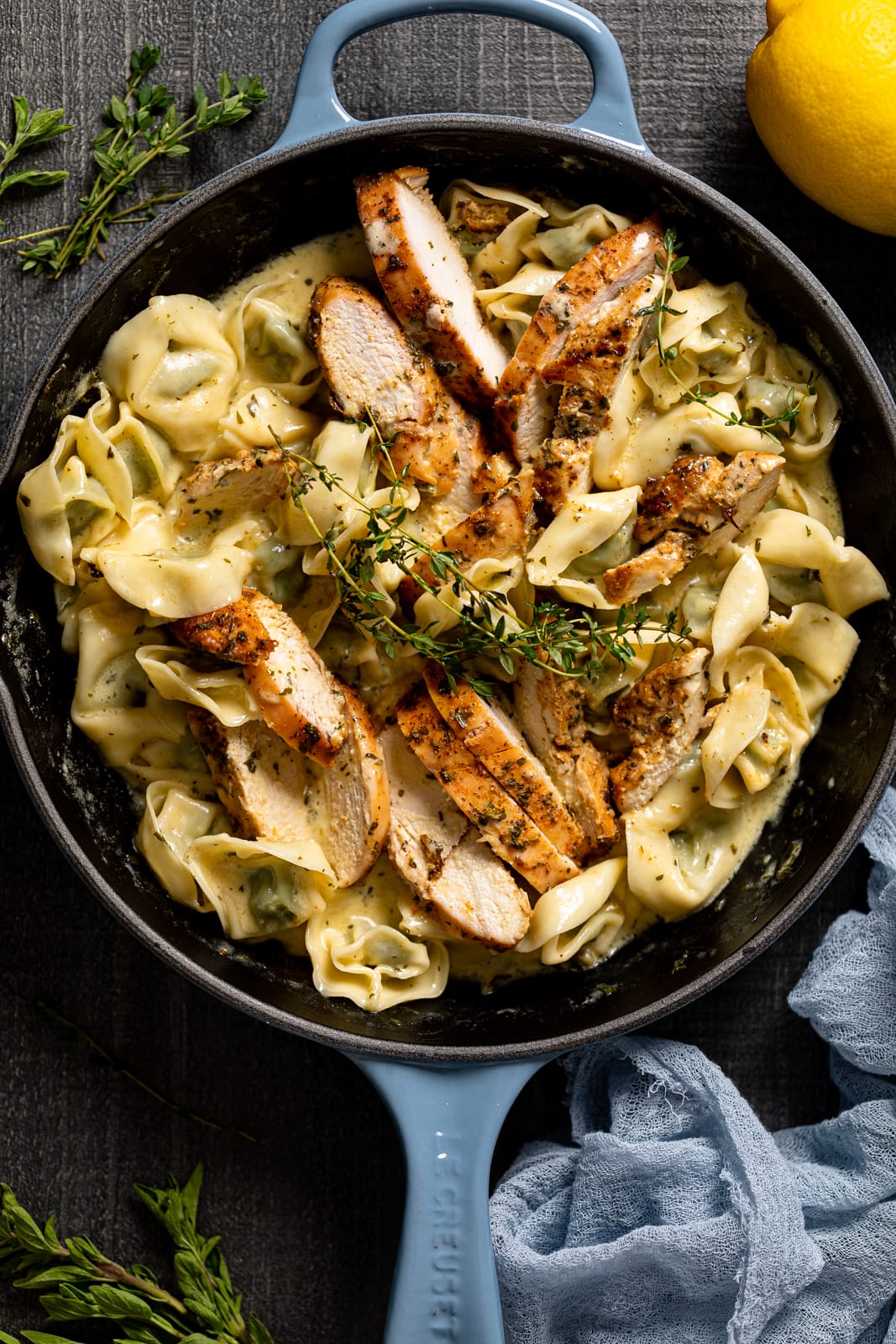 Skillet of Creamy Lemon Herb Roasted Chicken with Spinach Tortellini 